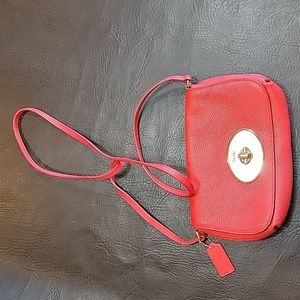 Coach purse in red in good condition.